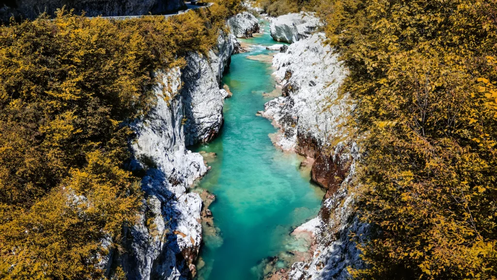 Soča River flowing through a rocky valley in Slovenia